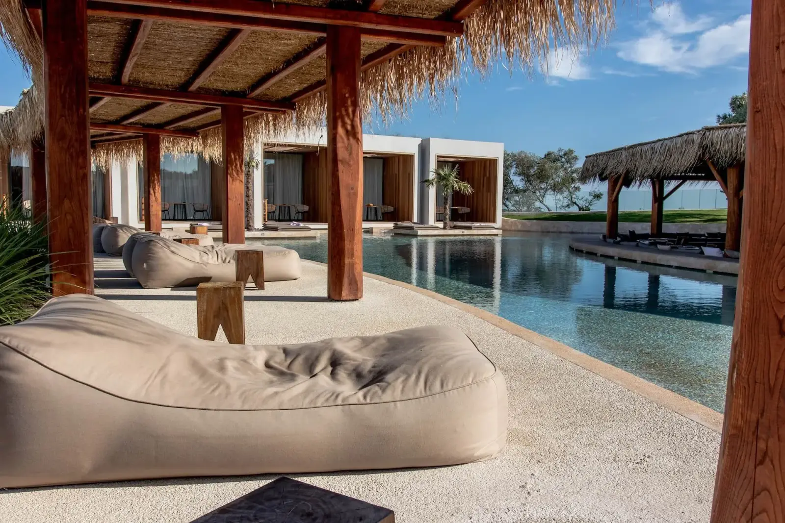 Palm-lined pool at a tropical all-inclusive resort
