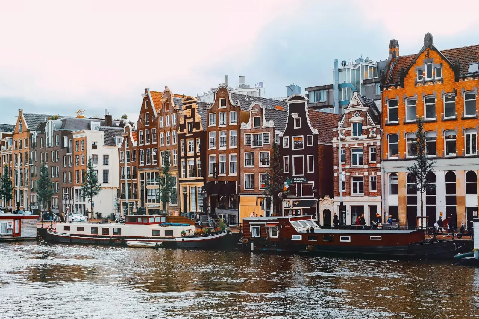 Gabled canal houses along an Amsterdam waterway