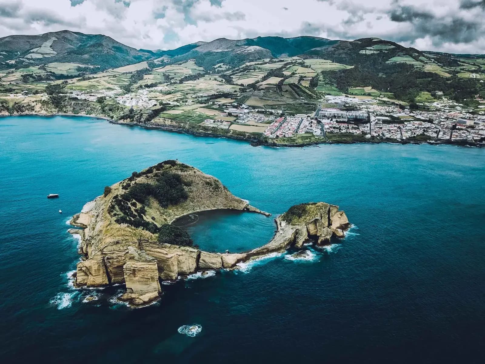 Dramatic volcanic cliffs and green valleys of the Azores