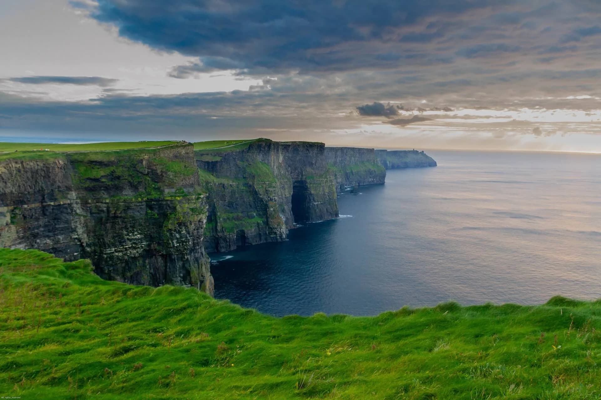 Sheer cliffs of Moher rising from the Atlantic Ocean