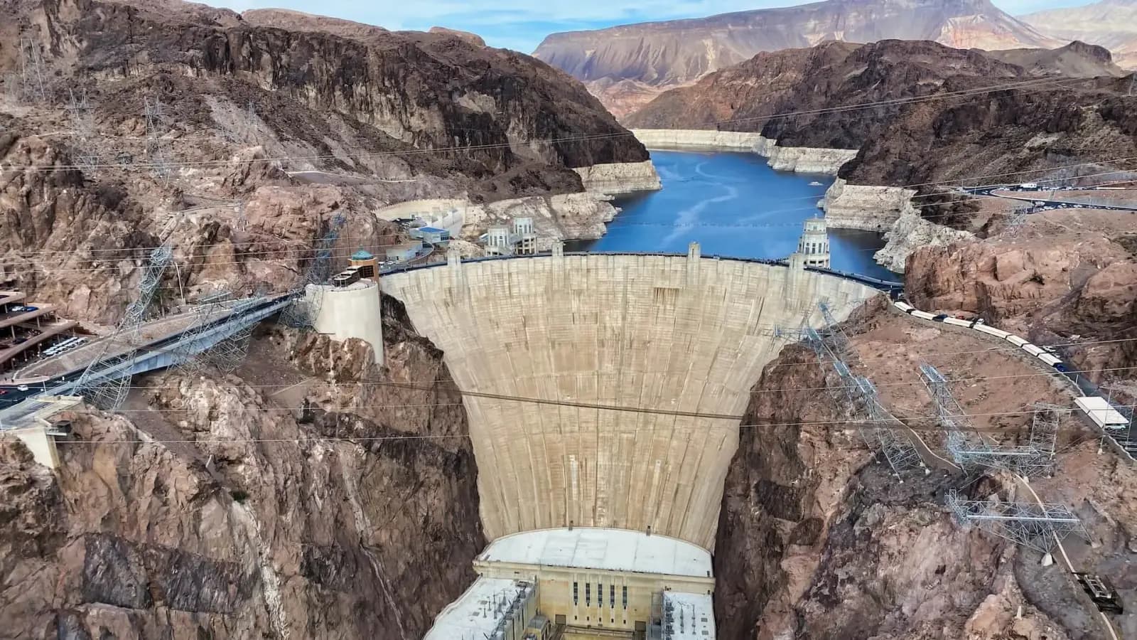 Hoover Dam's curved concrete face spanning the Black Canyon