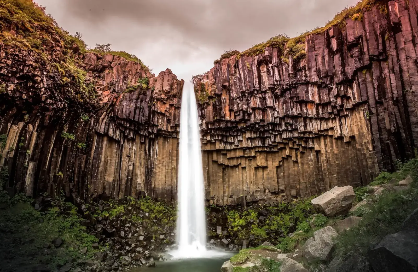 Powerful waterfall cascading over Iceland's volcanic cliffs