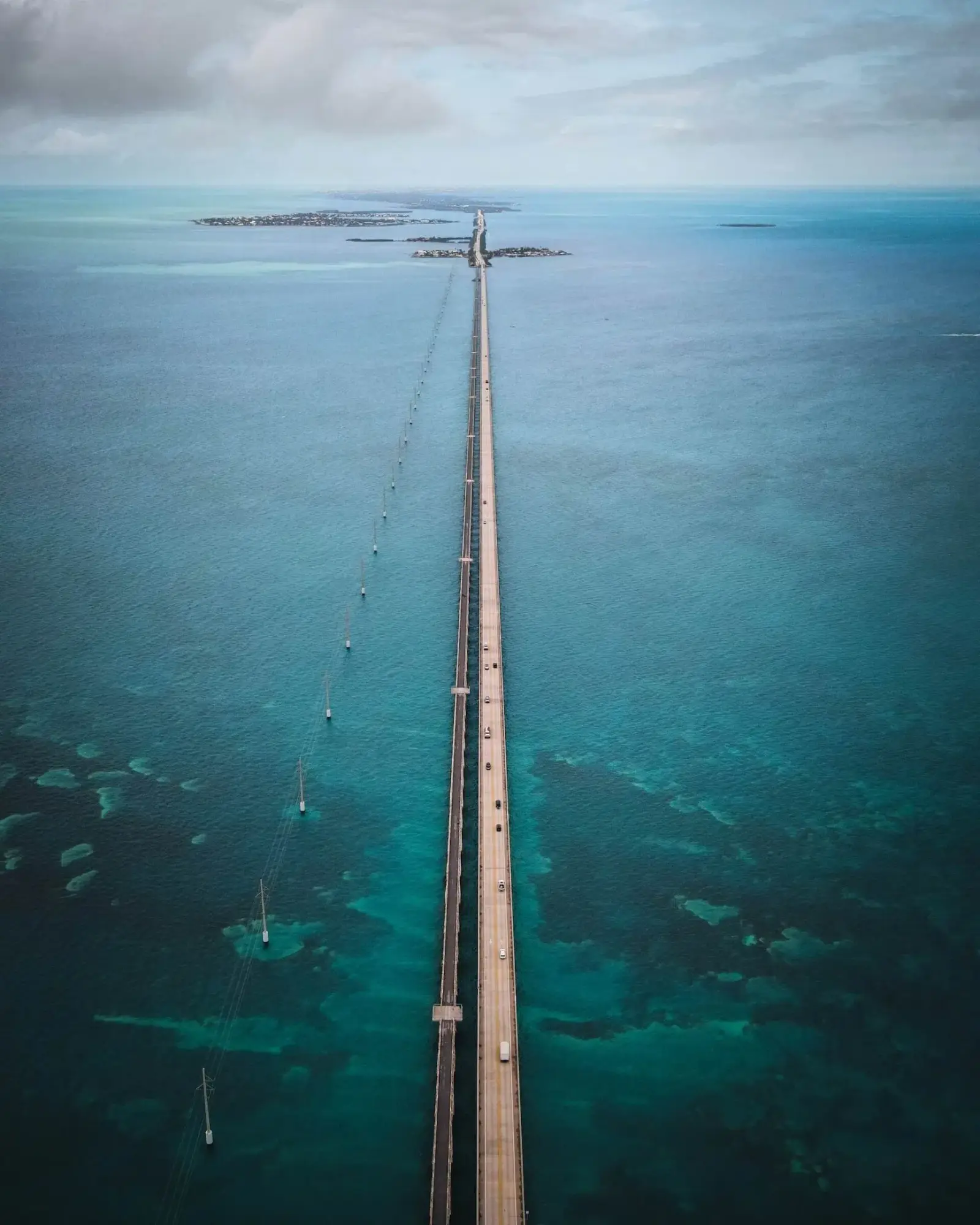 Aerial view of the Overseas Highway stretching across turquoise water in the Florida Keys