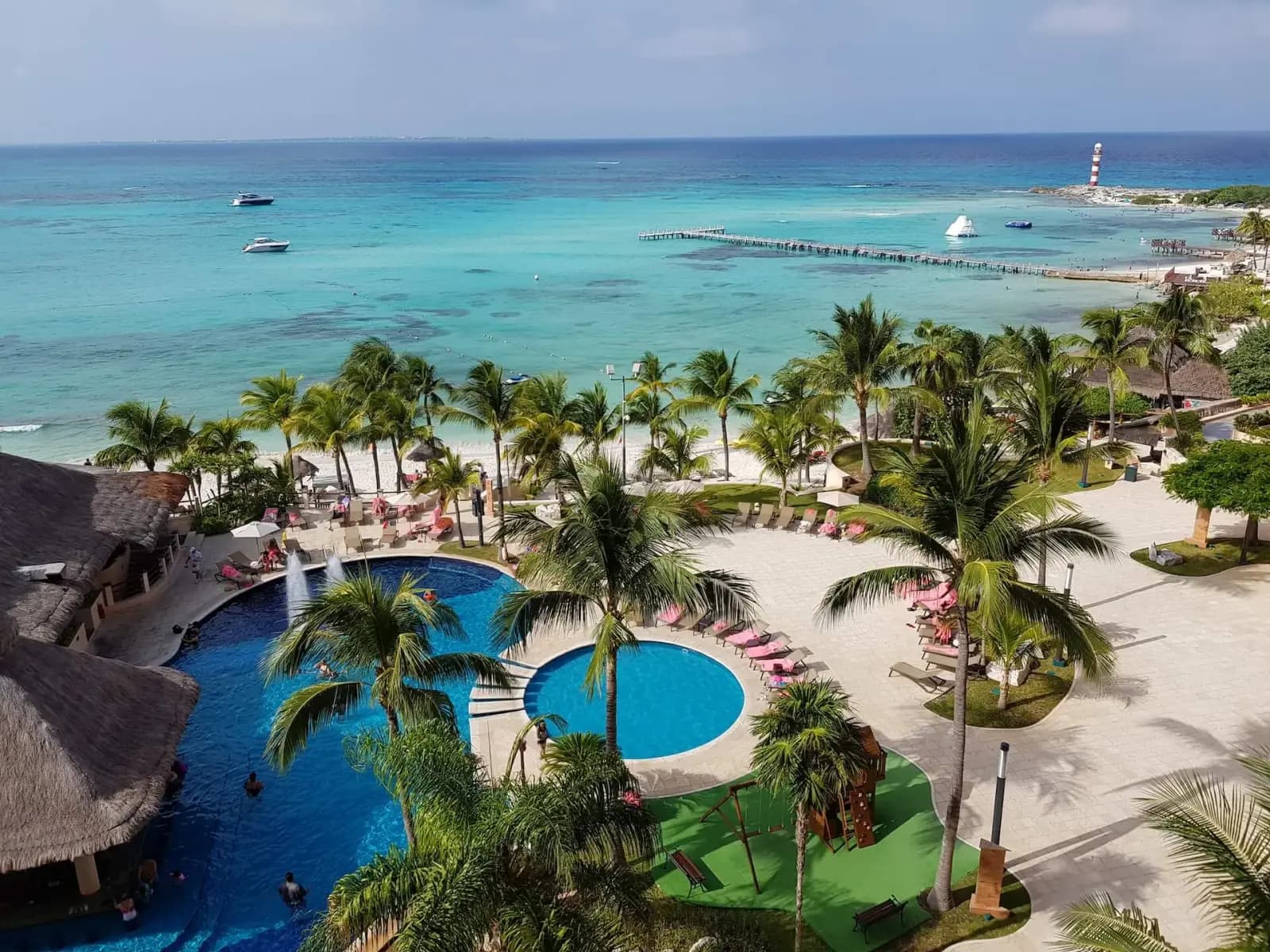 White sand beach with palms on Mexico's Caribbean coast