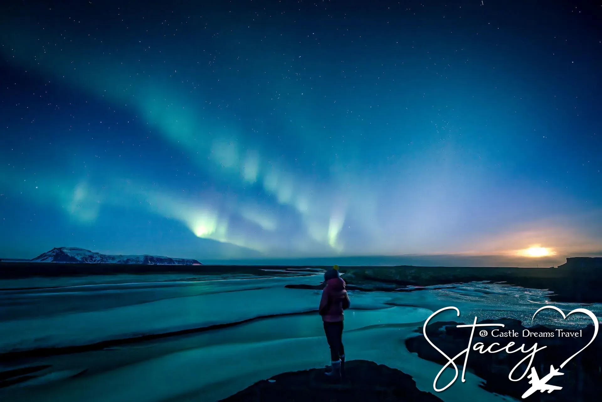 Green Aurora Borealis swirling over Iceland's night sky
