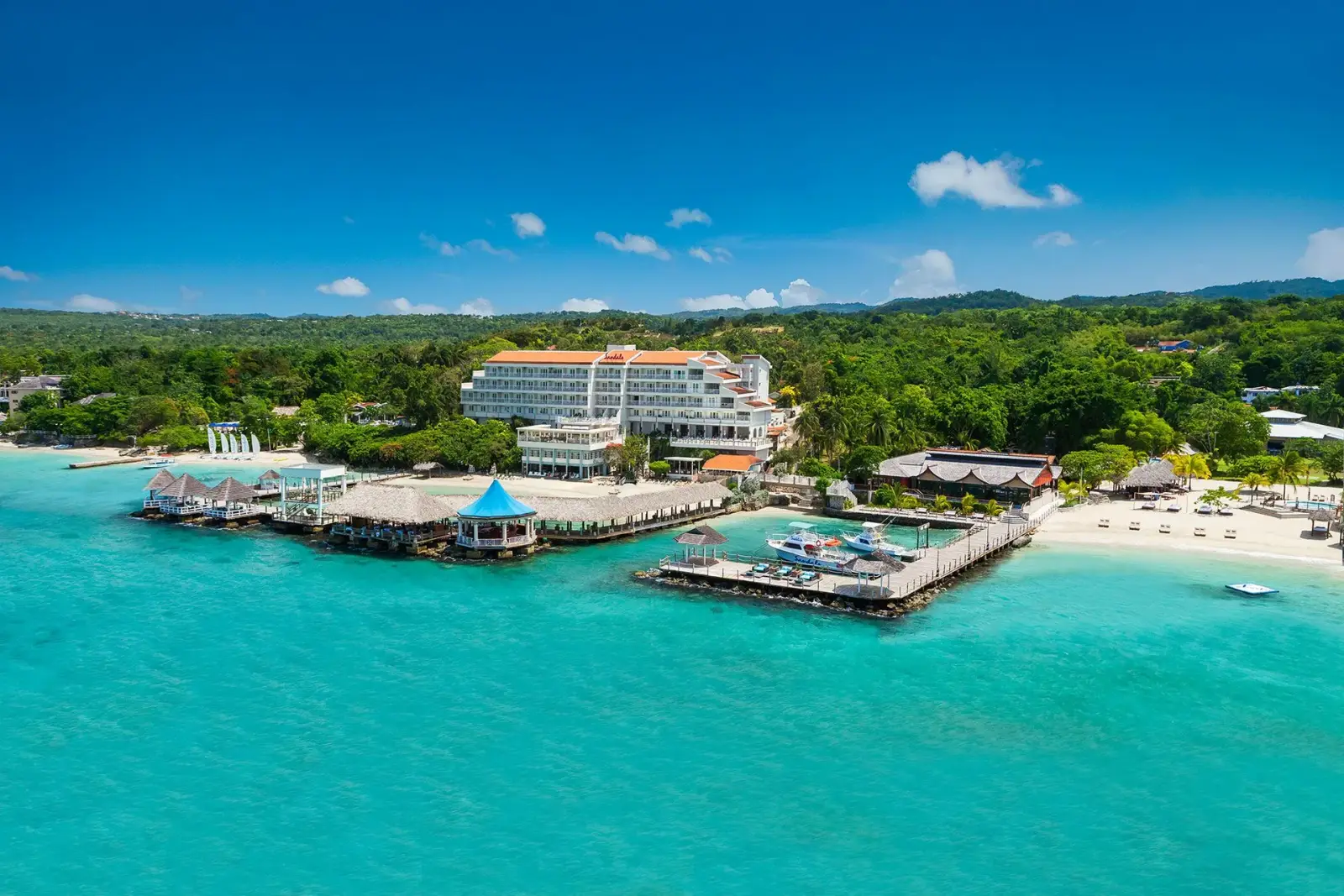 Hillside gardens and ocean views at Sandals Ochi Beach Resort