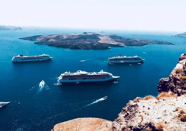 Cruise ship anchored off Santorini's caldera