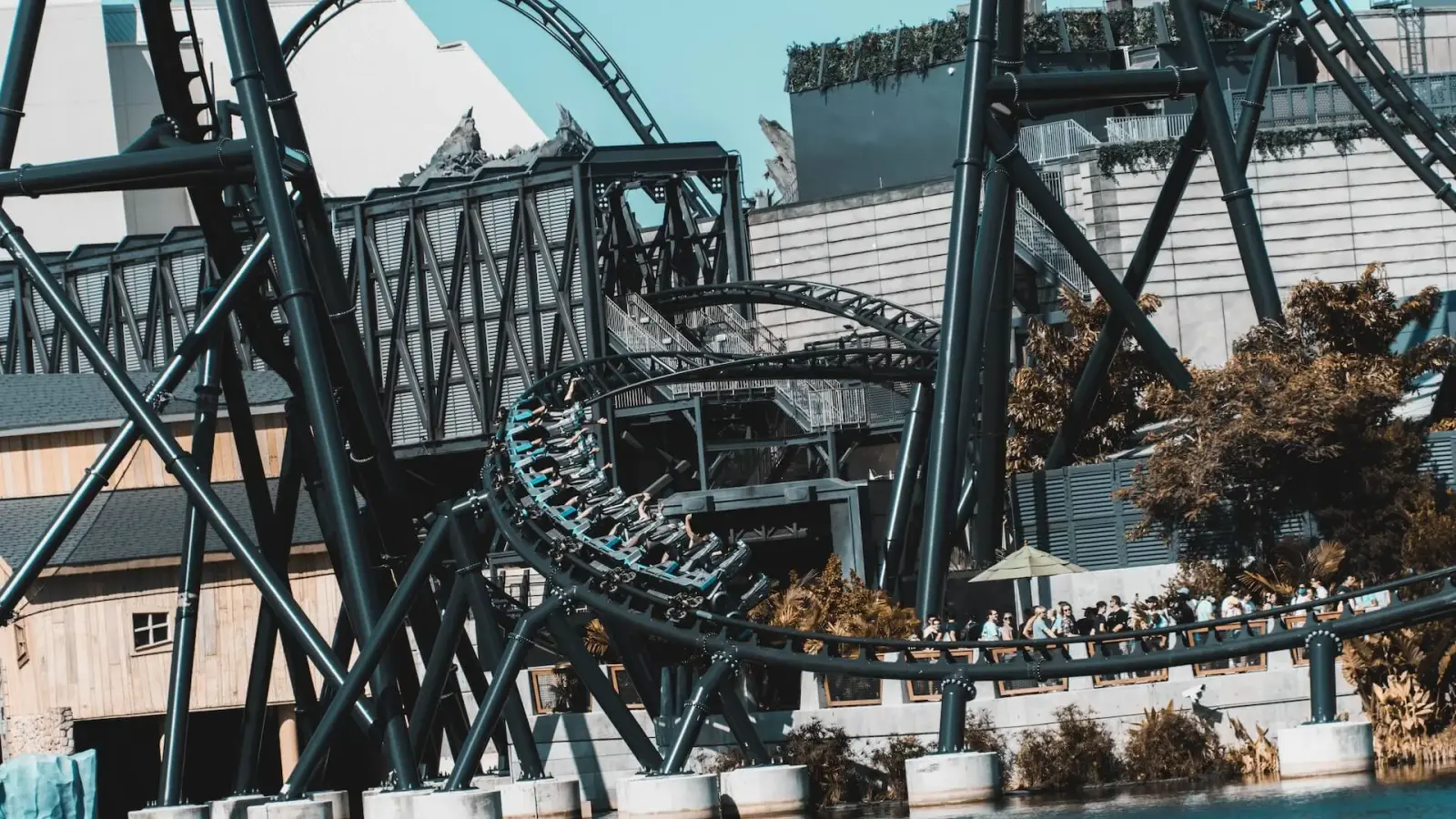 Roller coaster train weaving through the VelociCoaster track at Universal's Islands of Adventure