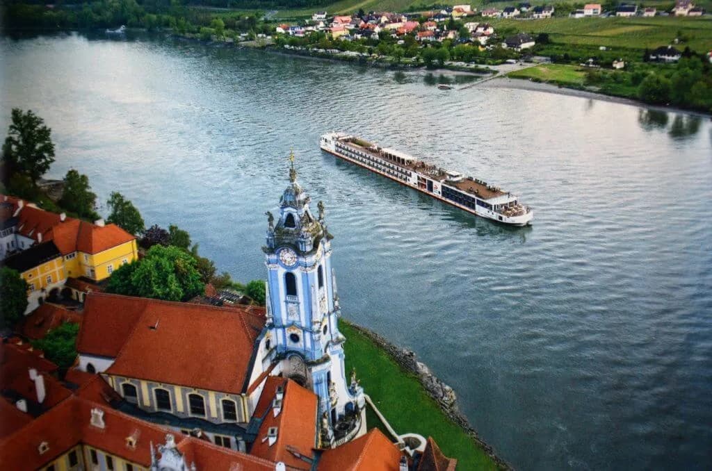 Viking river cruise longships lined up on a European river